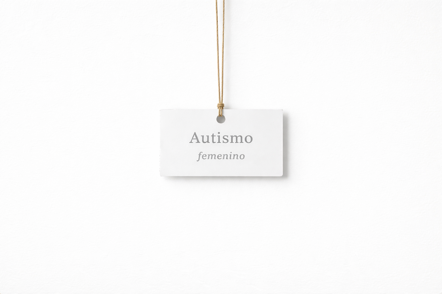 Letrero blanco que dice "Autismo femenino"